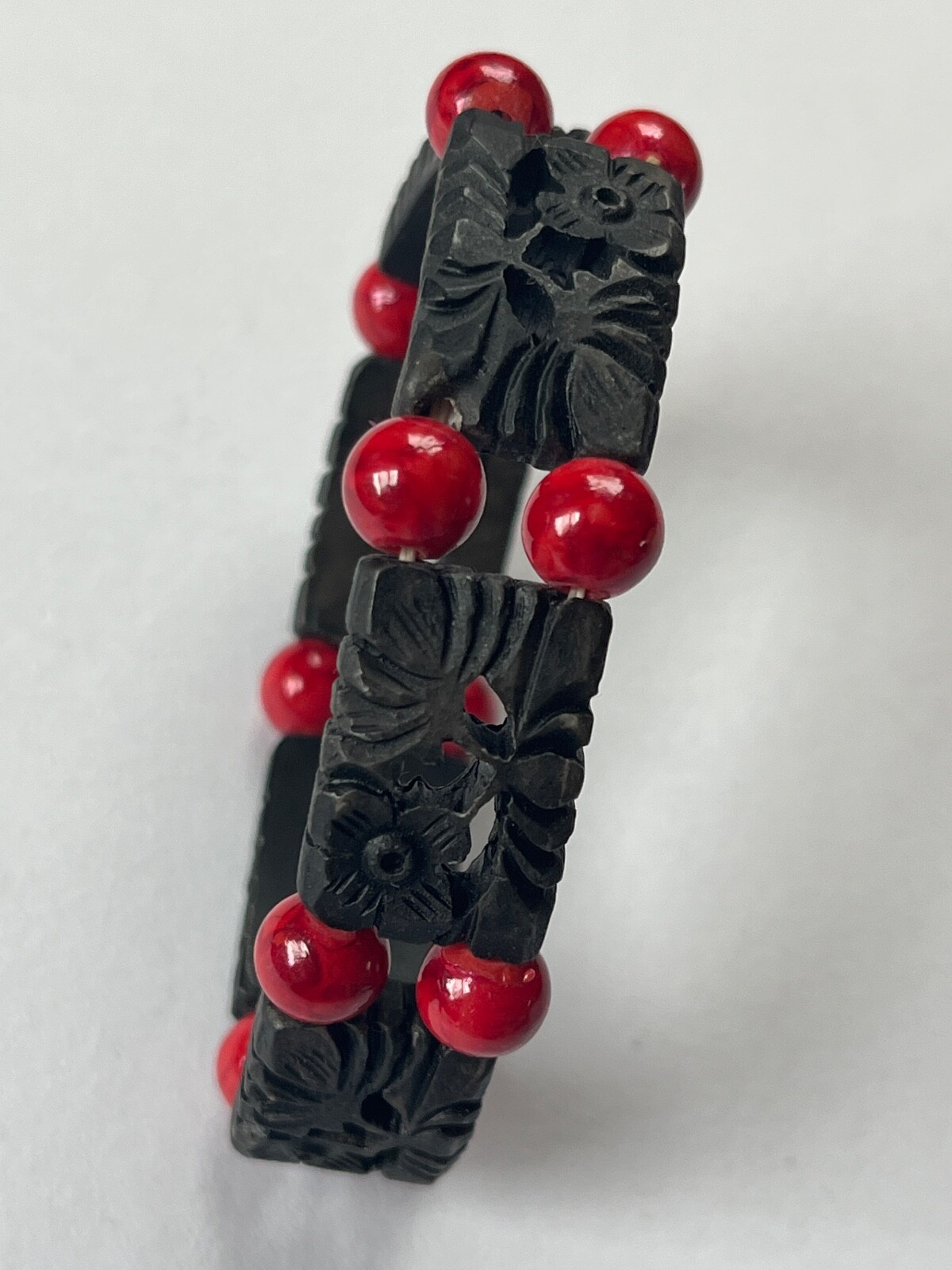 Alternating Carved Black Floral Rectangle & Red Round Plastic Beads Stretch Brac