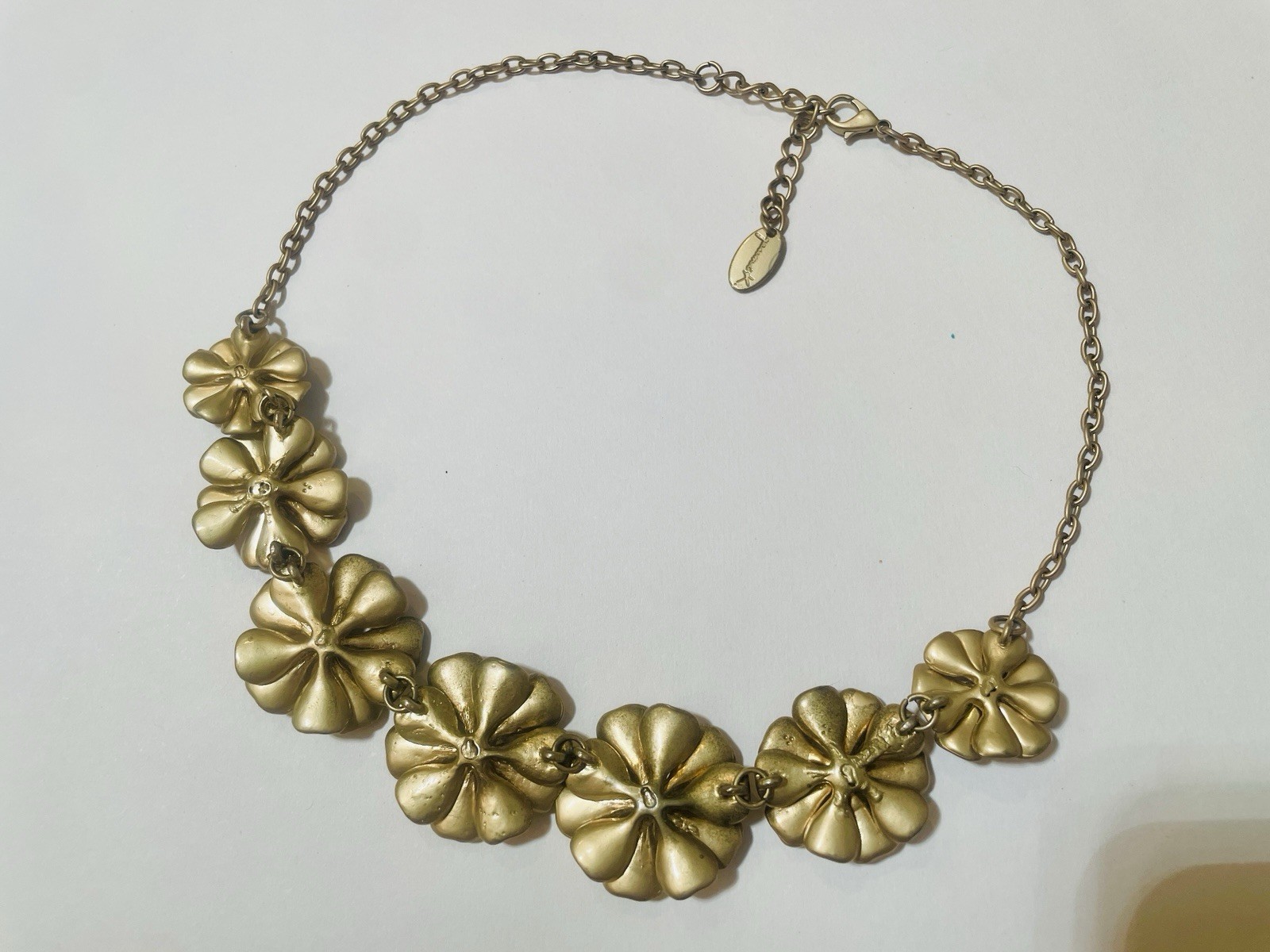 Youmi K sophisticated style Artistian line , known for being hand made signed