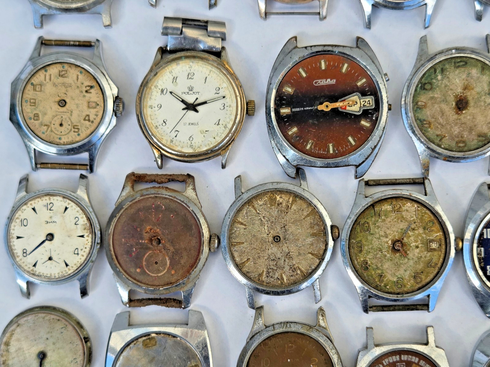 Lot of 75 Russian Watches Vostok Pobeda Mayak Zim etc Not working for parts Read