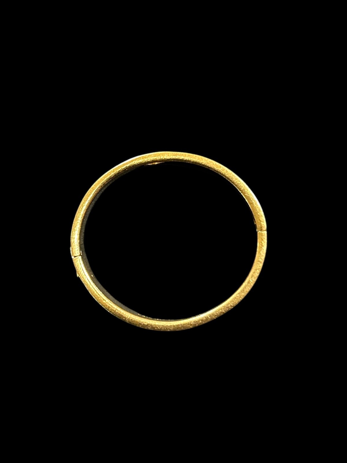 Kate Spade Black and gold Bangle Oval shape