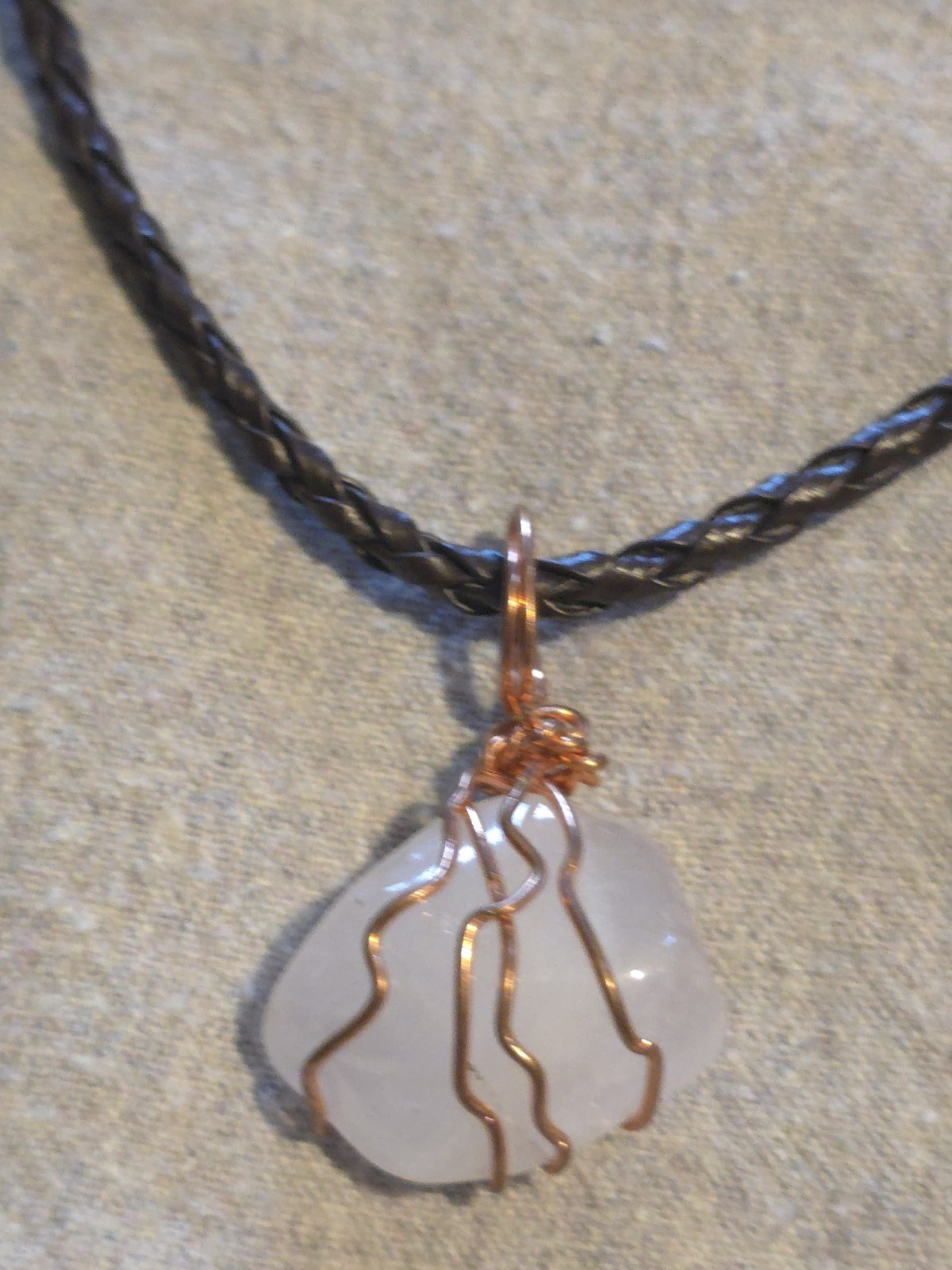 White Quartz Pendant On A Brown Leather Necklace