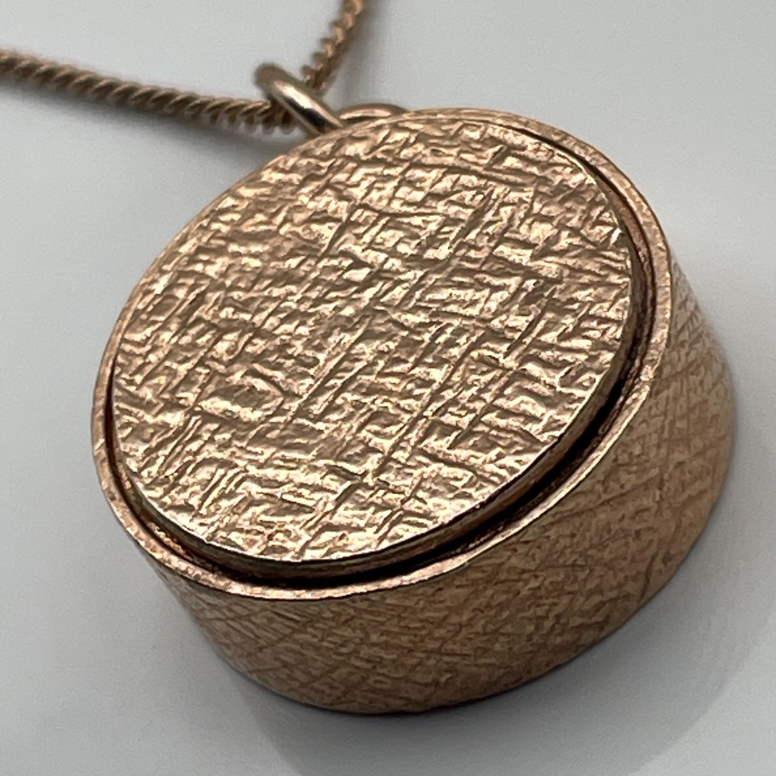 Rose gold on sterling silver/ruby amulet pendant and ‘925’ chain necklace 10.26g