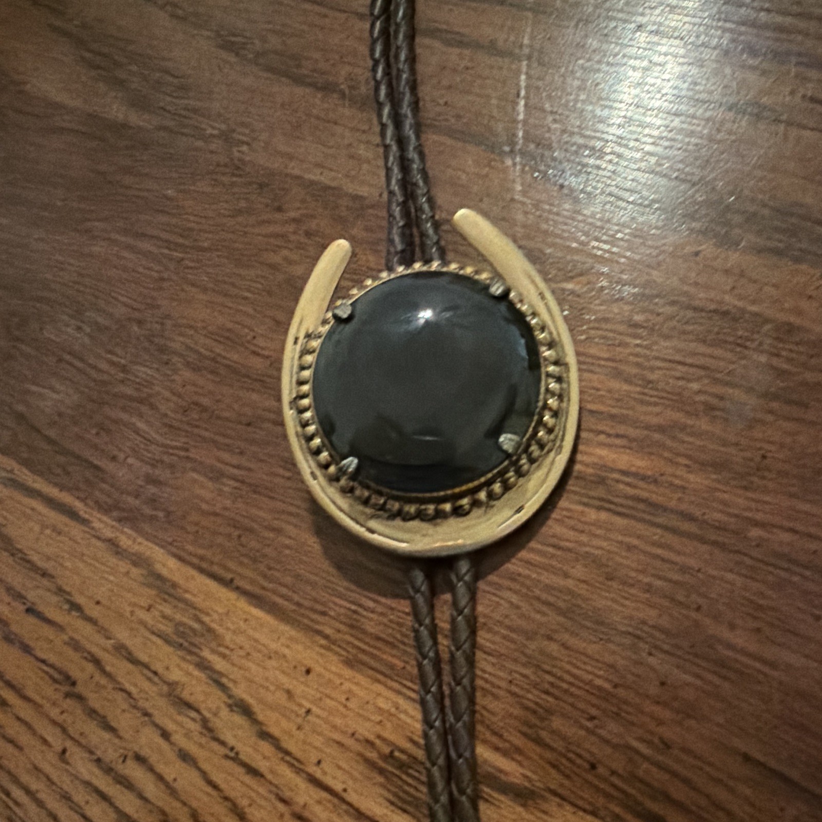 Men’s vintage Western Horseshoe Bolo Tie with natural black onyx pendant