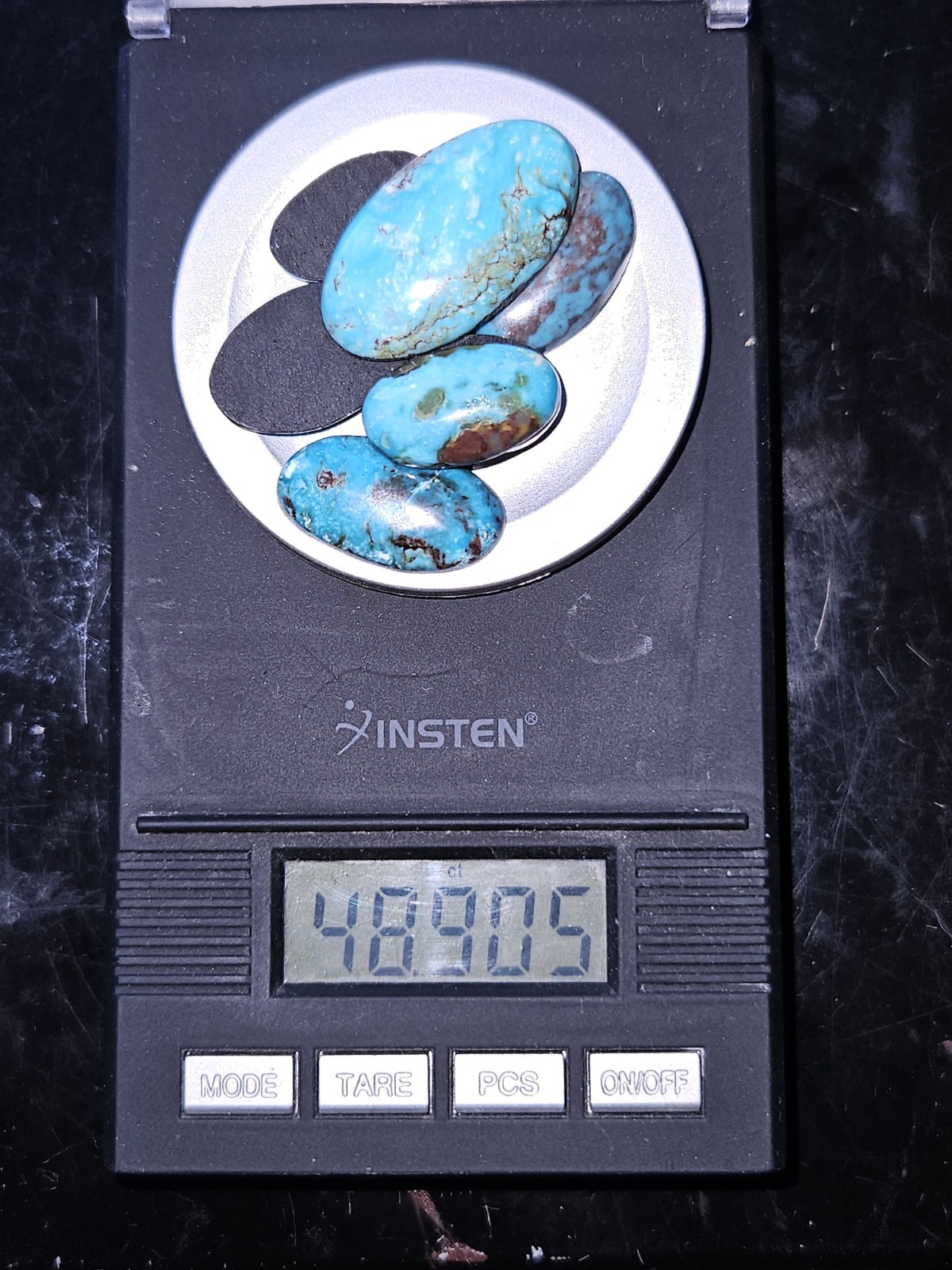 Rare Bisbee Turquoise Ovals – Backed – 7 pieces – 48.905 carats total