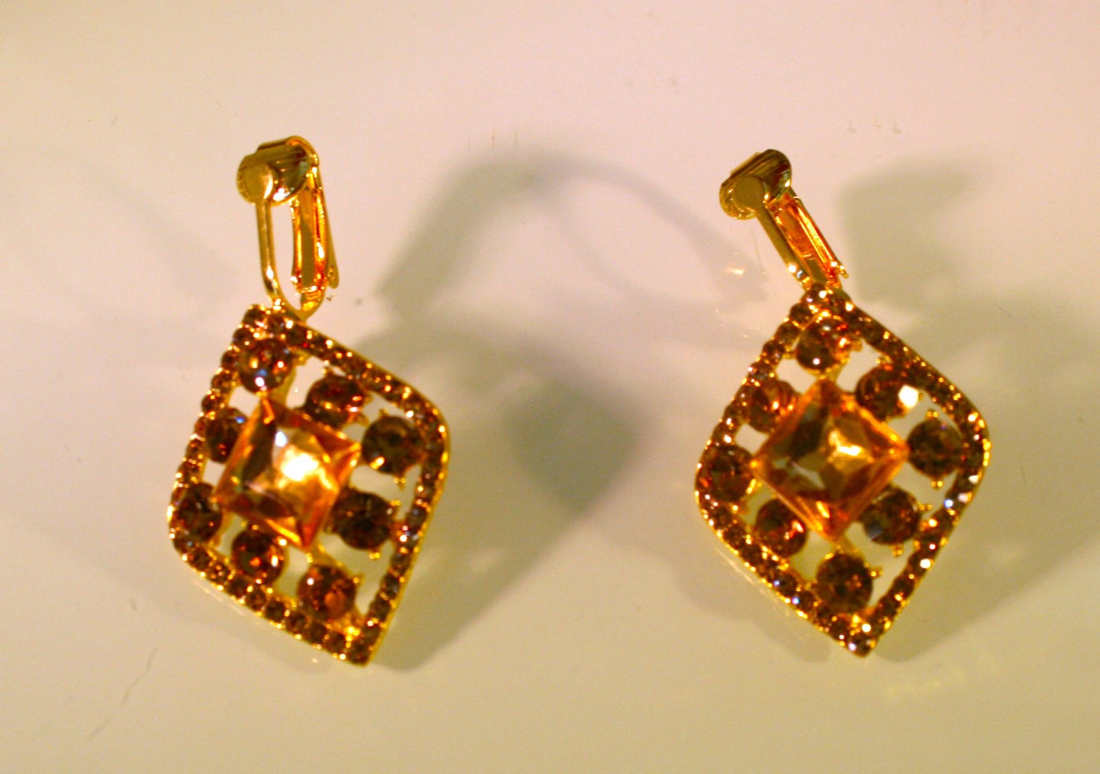 Gold plated topaz rhinestone vintage style clip on dangle earrings 1 3/4″