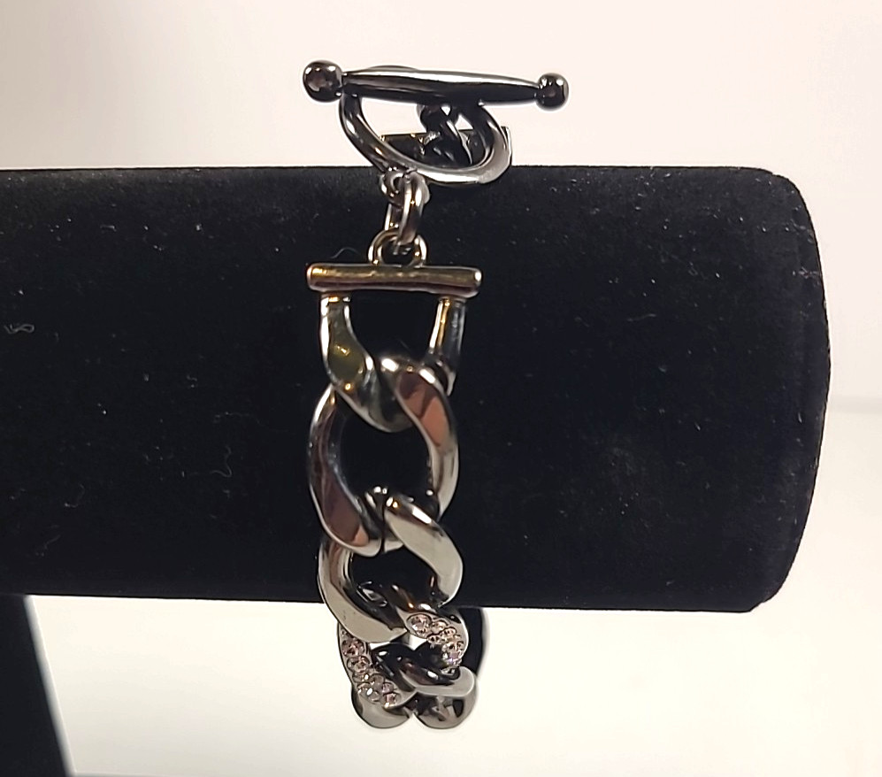 Gunmetal Toned Curb Link Bracelet with Crystal Accents.