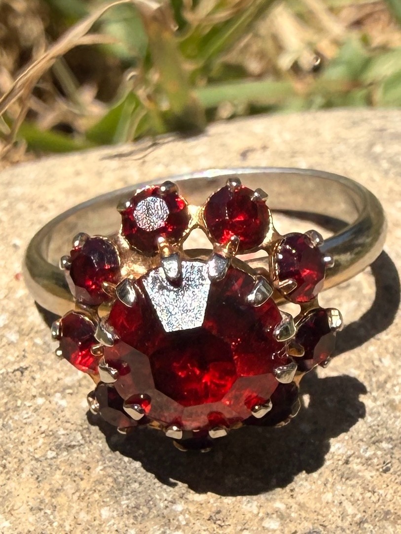 Deep Burgundy ring features a cluster of red rhinestones in a gold-tone setting.