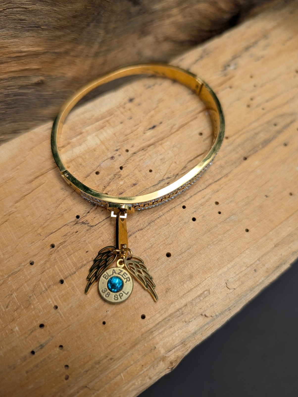 Silver or Gold Stainless Zipper wing and Bullet Bracelet. Optional Glass Crystal