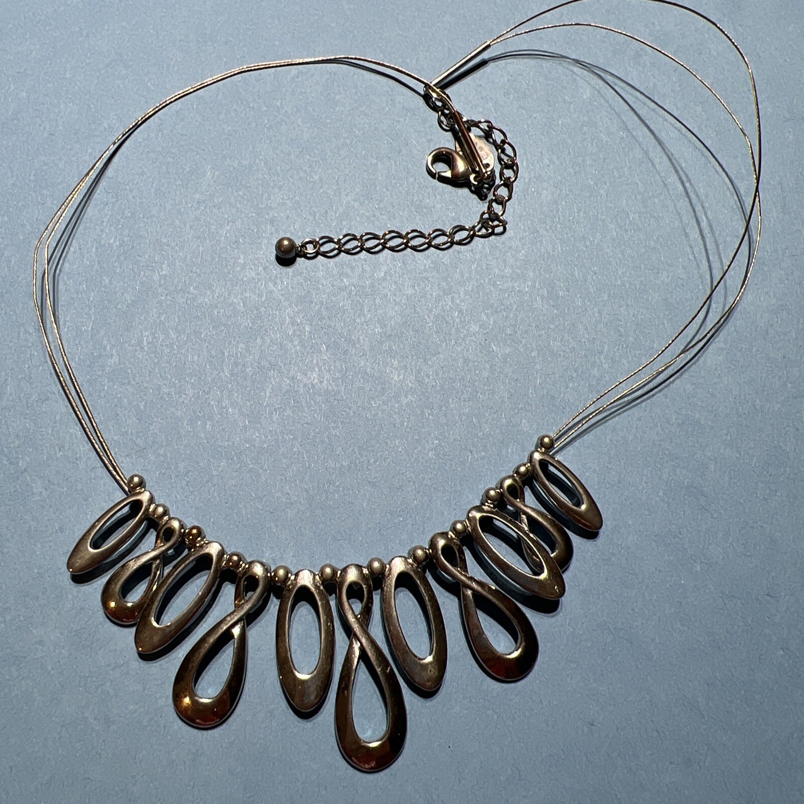 Lia Sophia Tear Drop Twist Pendant Wire Necklace Silver Tone Finish