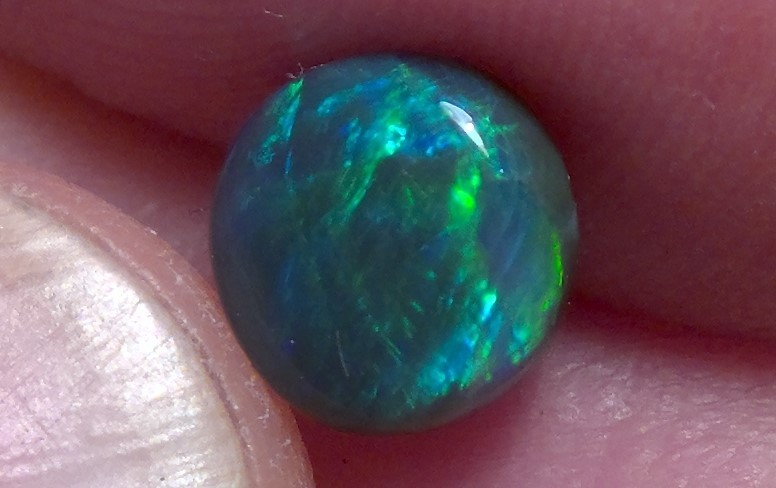 1.25cts solid Lightning Ridge black opal, stunning multicolour *see video*