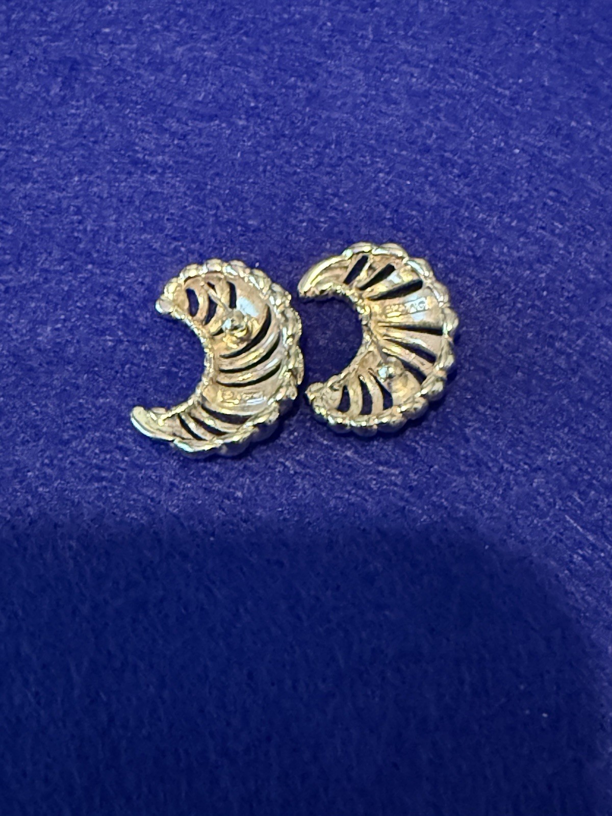 Vintage Monet signed Silver tone ribbed crescent post back earring