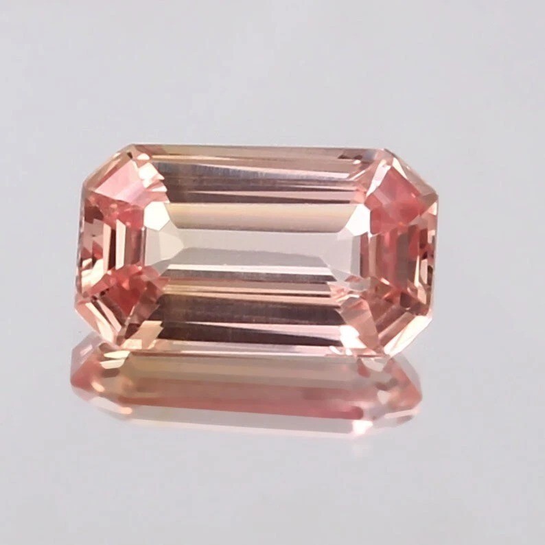 Top Grade Ceylon Padparadscha Sapphire 9.80 Ct Loose Long Emerald Cut Unheated