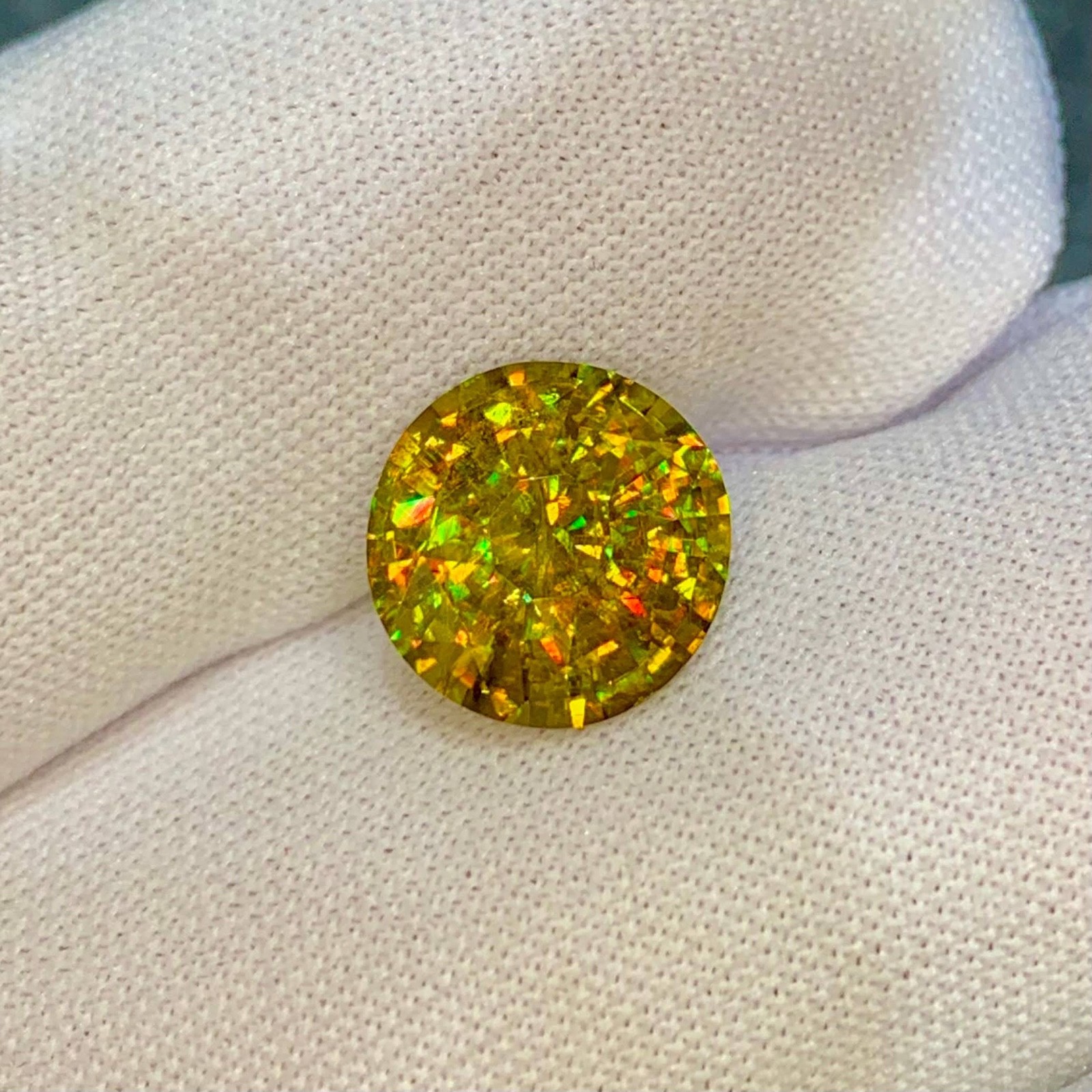 5.37 Carats Natural Fancy Rainbow Sphene Round Cut From Madagascar