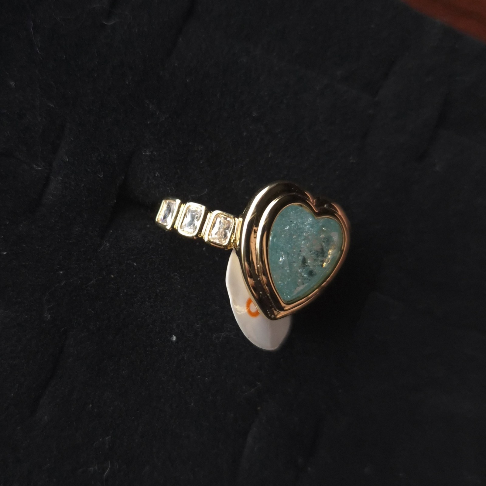 Bomb Party Slow Burn Soft Shine Size 6 In Gold With Blue Topaz Ice Heart