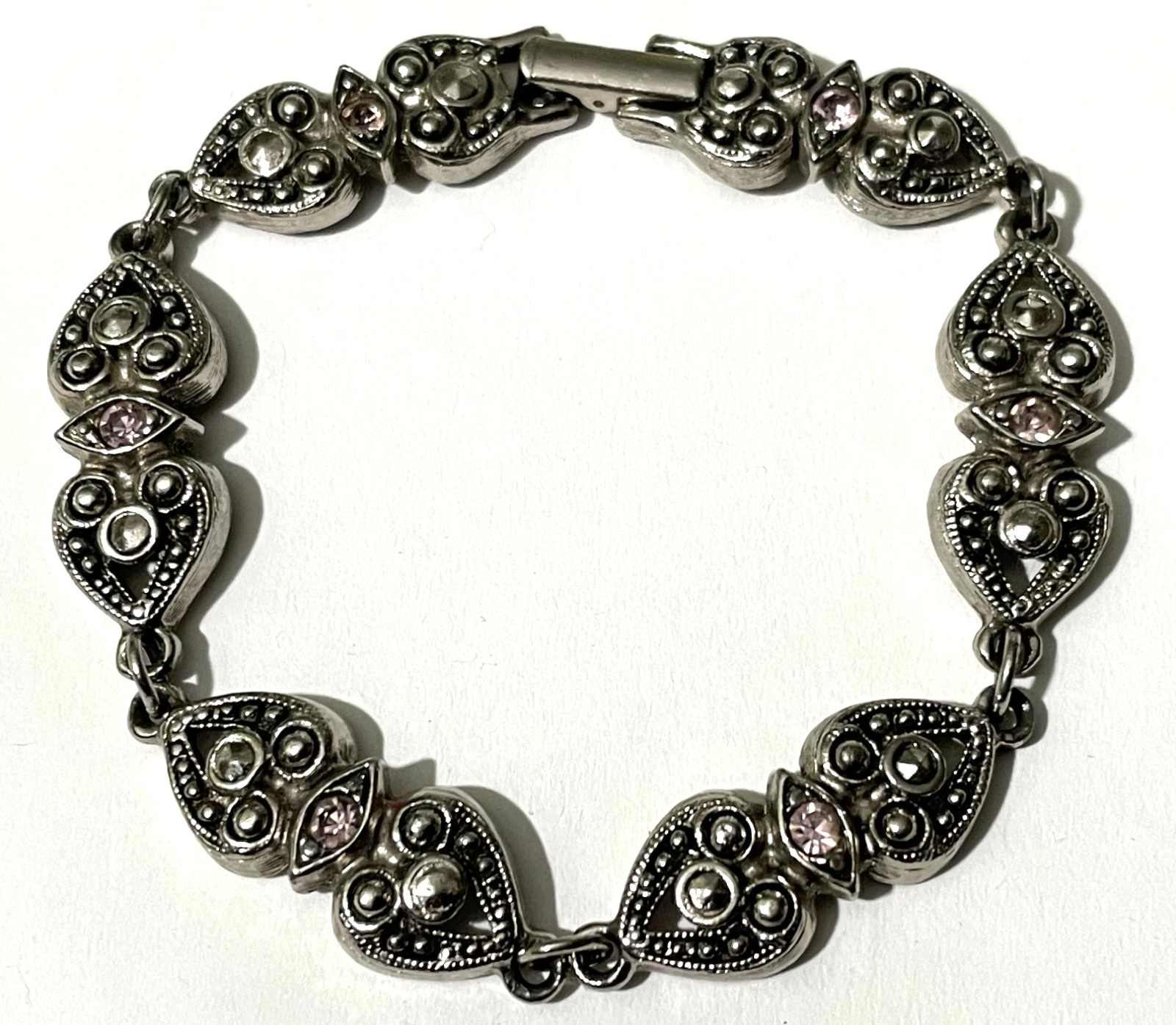 Vintage Silver Tone Avon Bracelet with Hearts and Pink Rhinestones 6.75 in.