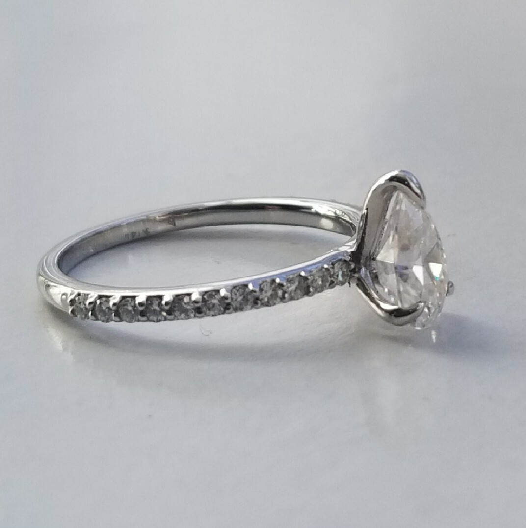 1.50 CARAT FOREVER ONE MOISSANITE PEAR SHAPE CHARLES & COLVARD RING