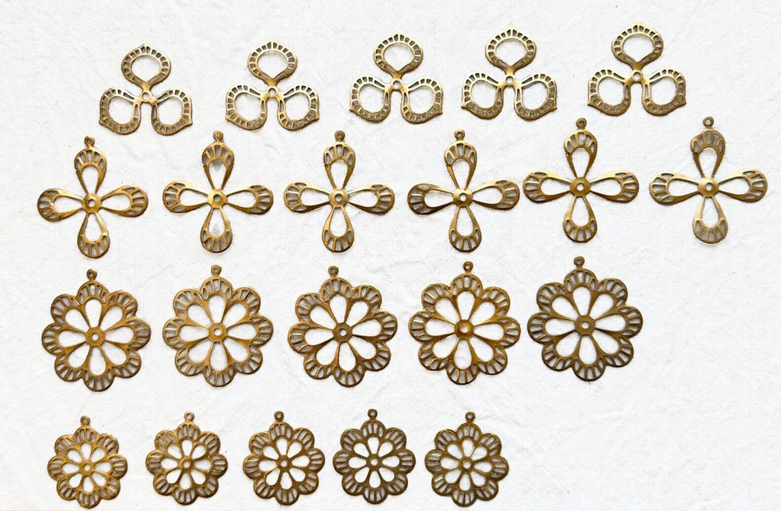 Jewelry Stamping – Group of raw brass filigree stampings – 21 pieces in total