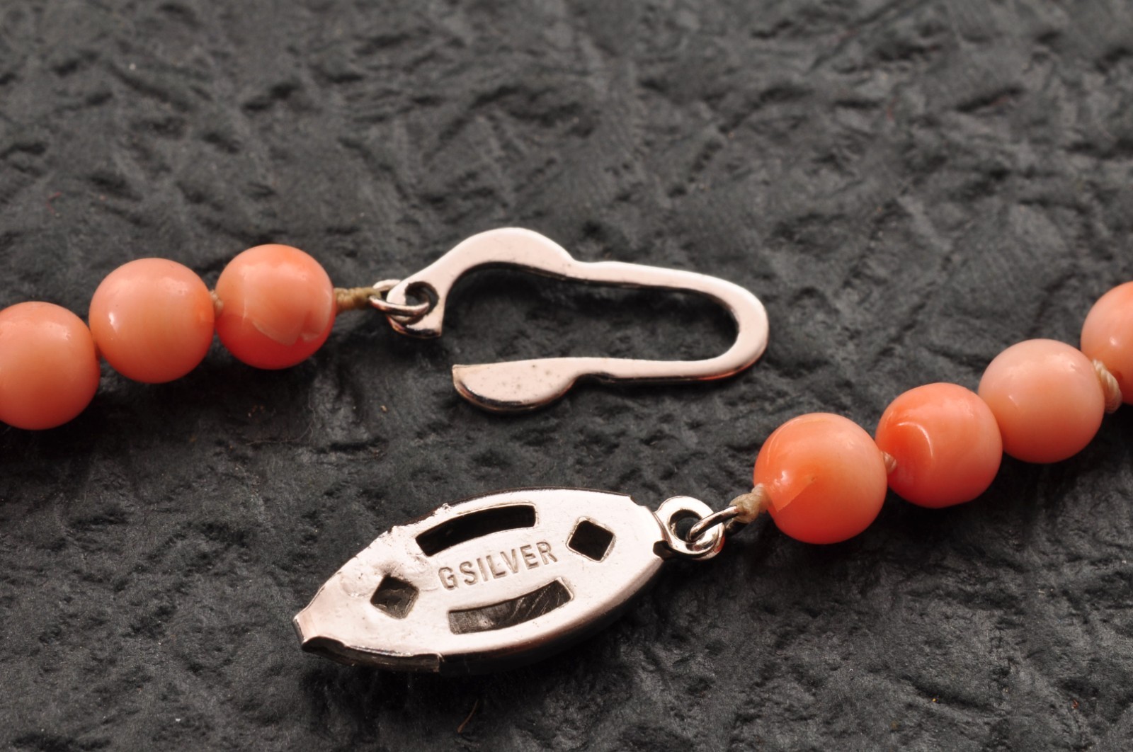 Salmon pink coral Necklace and ear clip set (total 116ct) with Certificate case.