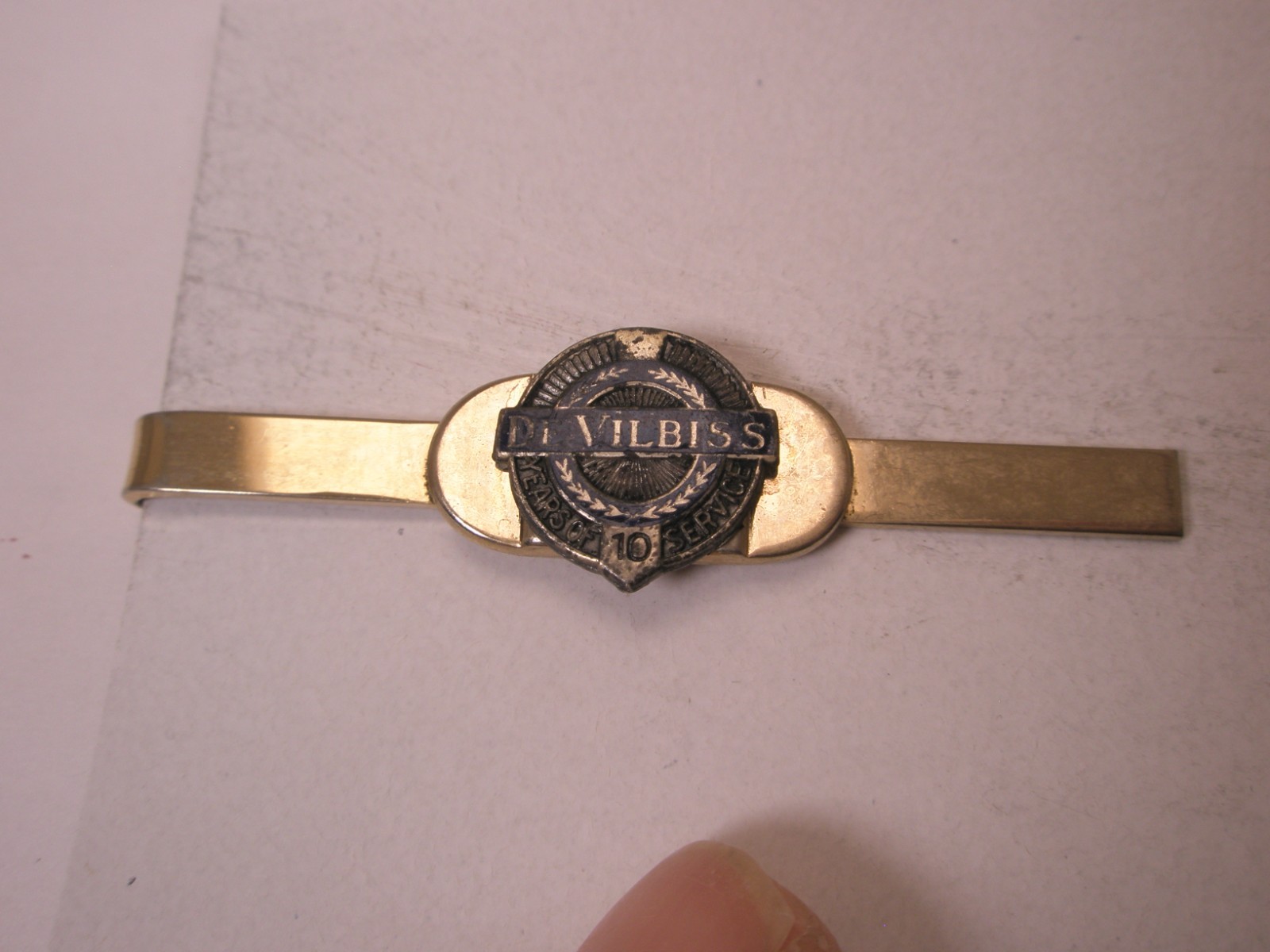 DeVillbiss 10 Years Employee Service Vintage Tie Bar Clip assets debt