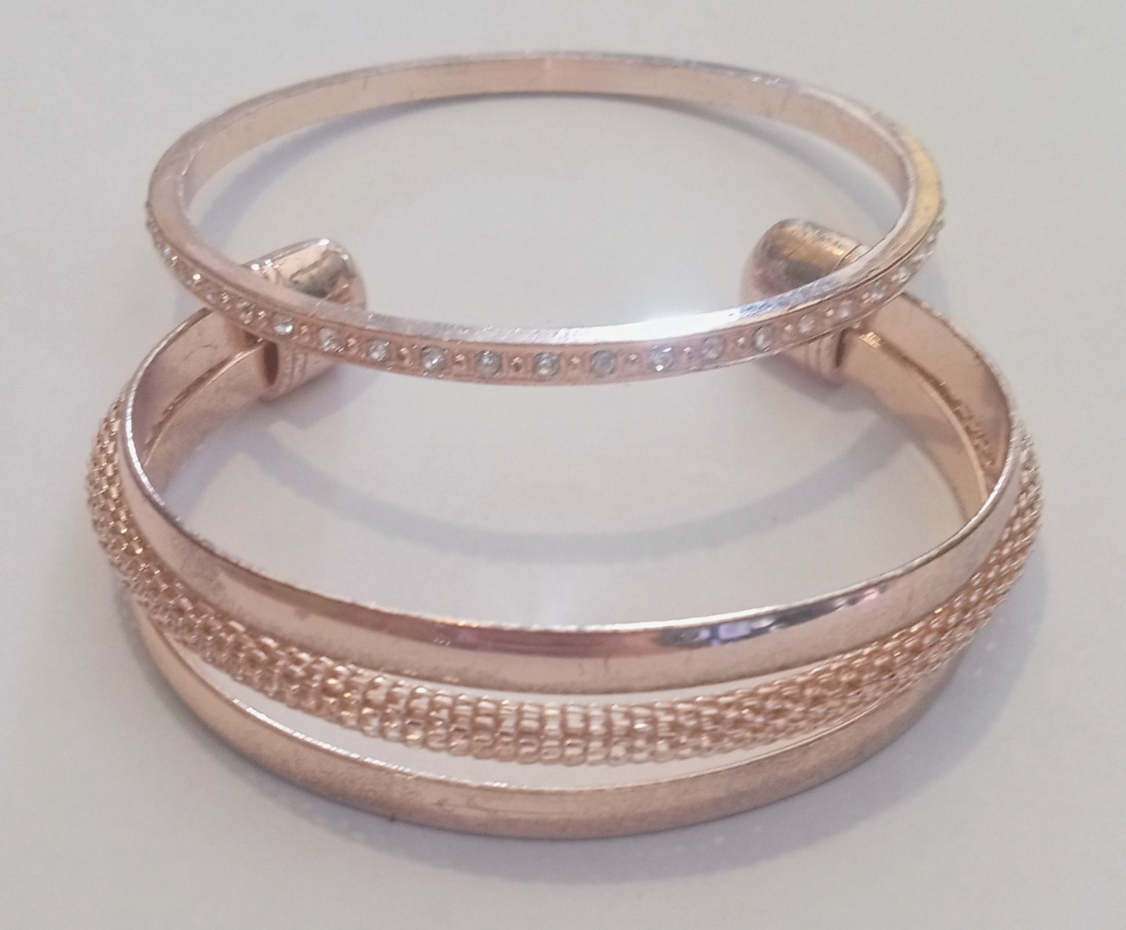 Pair Of Rose Gold Colored Bracelets One Bangle With Rhinestones One Cuff