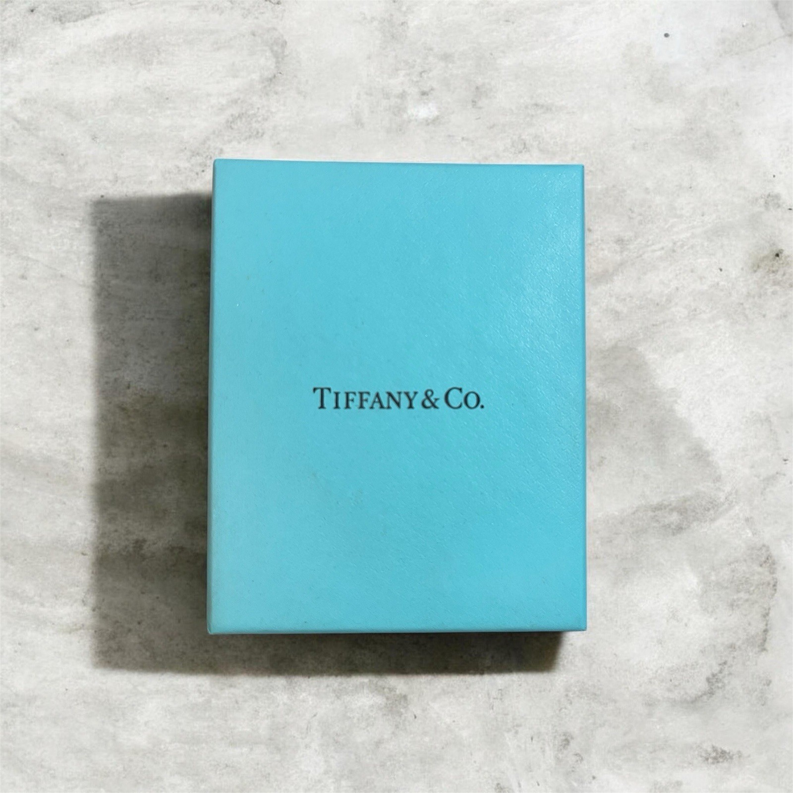 Small Tiffany and Co. box with foam and sleeve
