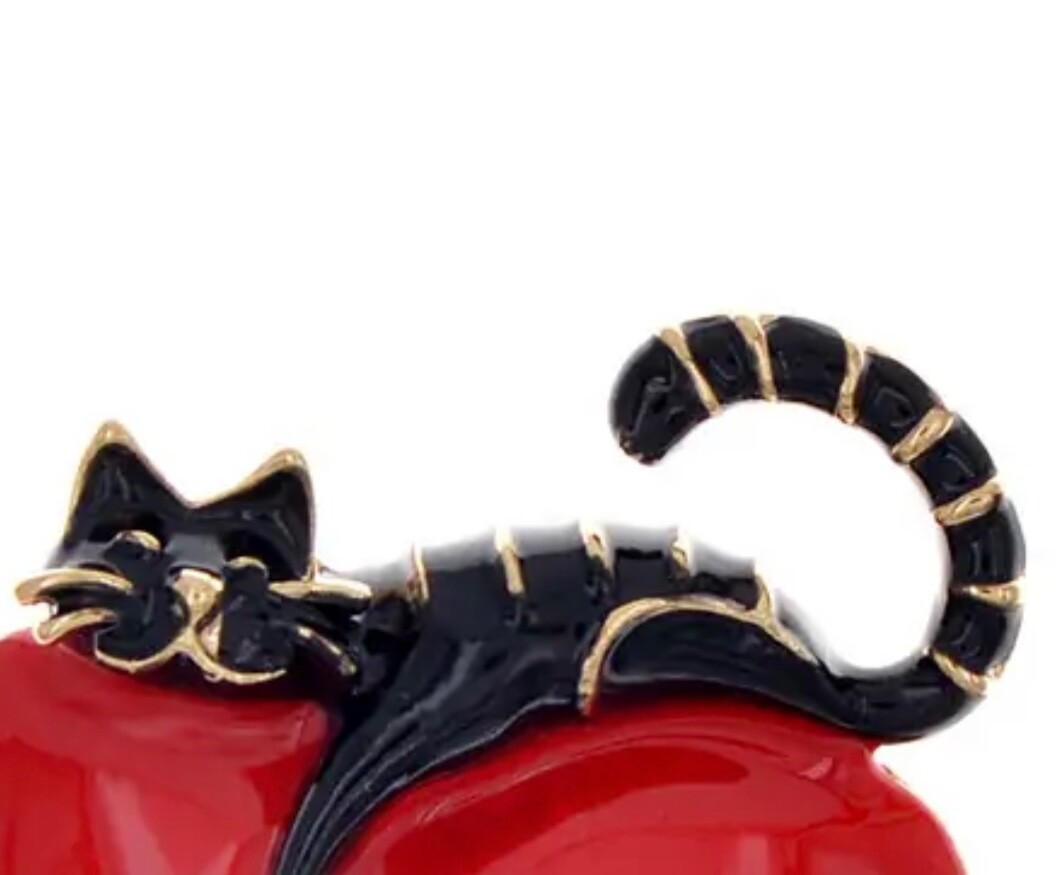 Rich red, shiny heart with comfy cat resting on top. Puffed up. Pin, brooch.