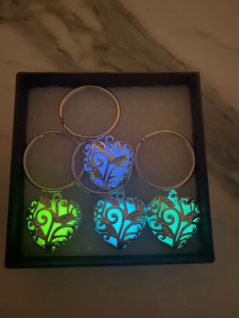glowing heart necklace with matching key ring.