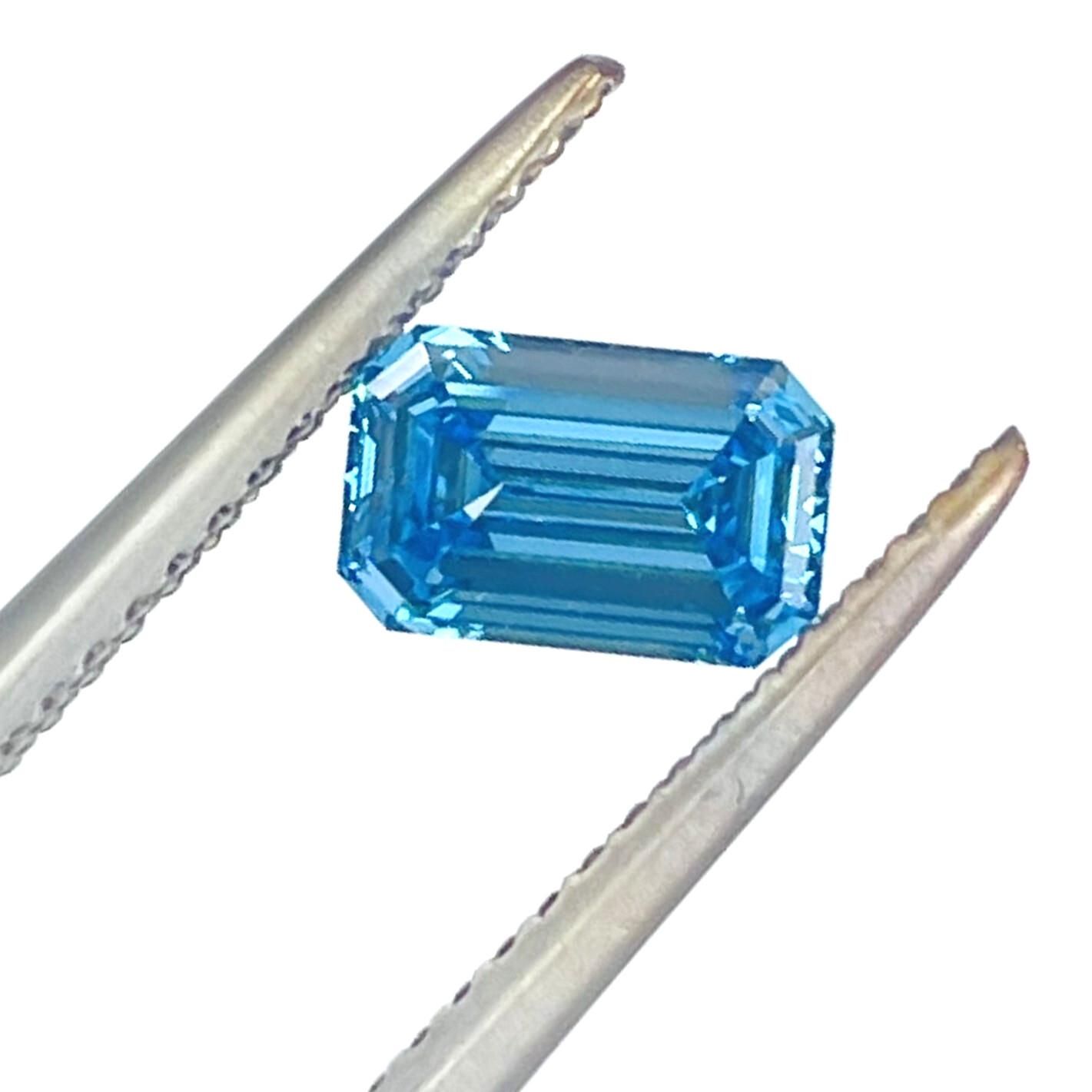 0.78 Carat Fancy VIvid Blue Diamond GIA Certified VS1 Emerald Cut