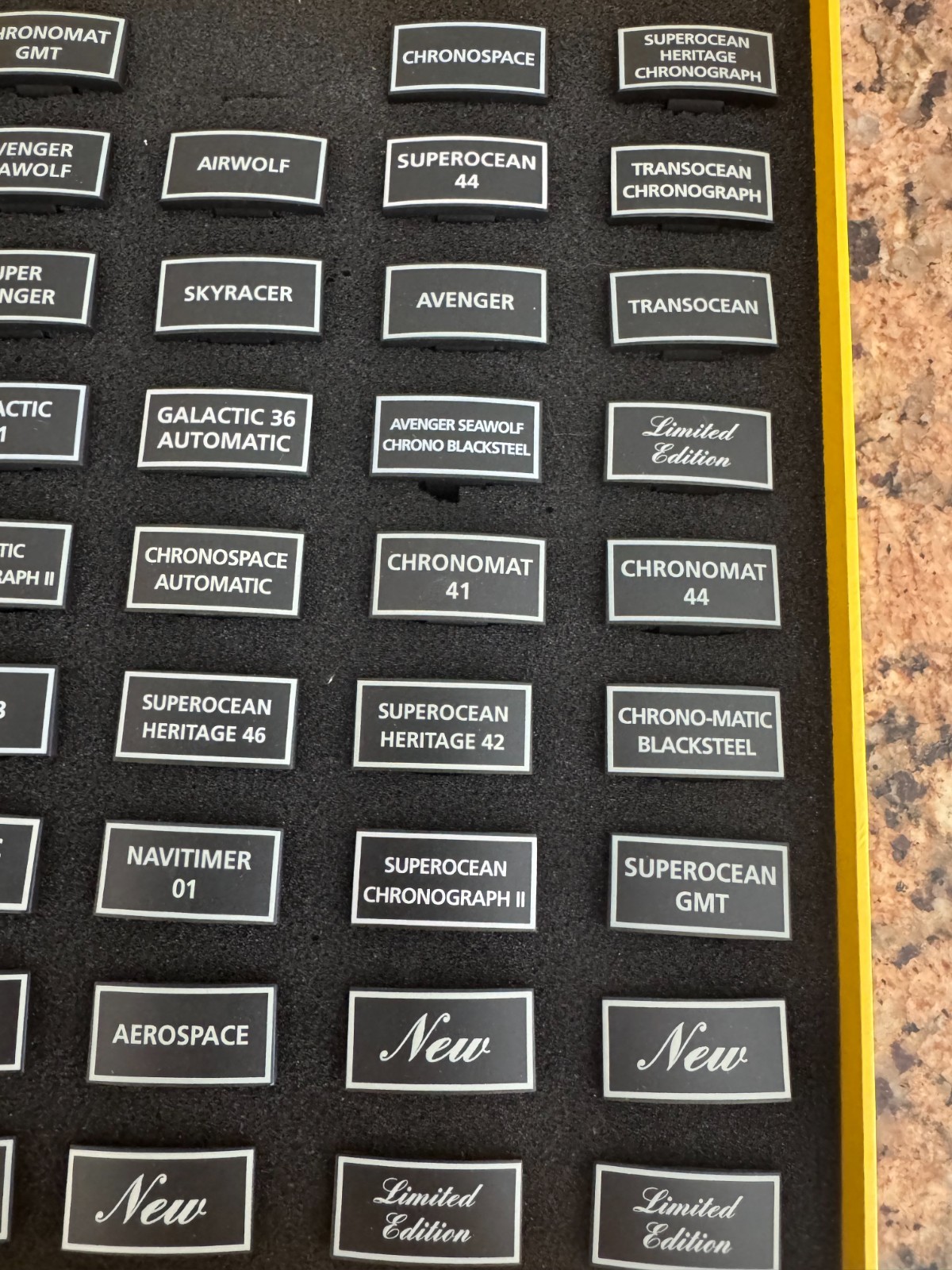 GENUINE BREITLING BOX WITH 44PCS OF VARIES PLASTIC PLAQUES FOR DISPLAY WATCHES