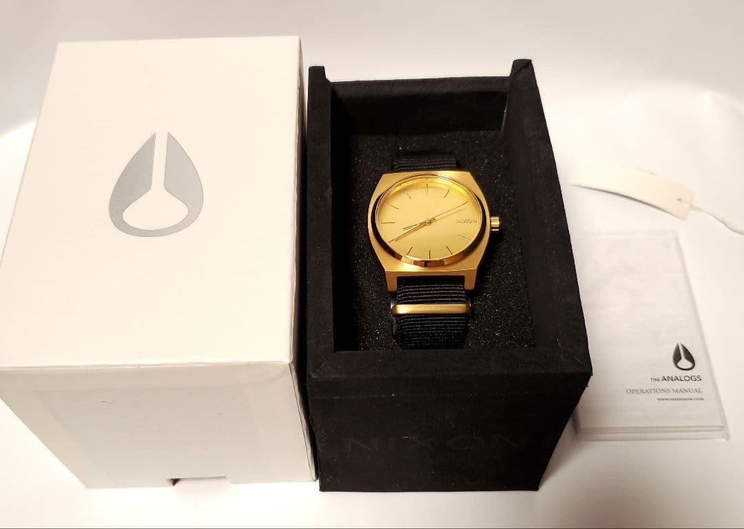 NIXON TIME TELLER GOLD/BLACK, brand new, unused, and fully functional.