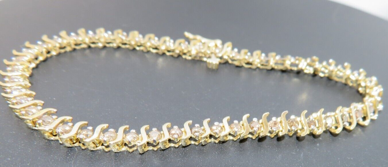 10K LADIES DIAMOND TENNIS BRACELET 1.00 tcw 7″ LONG 4.49 MM WIDE 6.42g(6132597-9