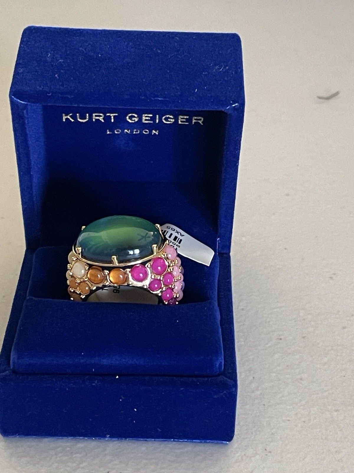 KURT GEIGER LONDON GOLD TONE LARGE OVAL MOOD RING IN MULTI 8
