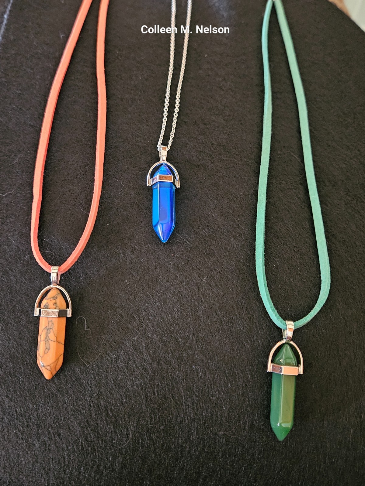 crystal pendants with silver, leather cord, medium length, various colors