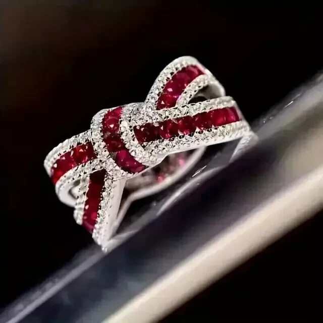 Lab Created Red Ruby Women’s Anniversary Knot Band Ring In 14K White Gold Plated