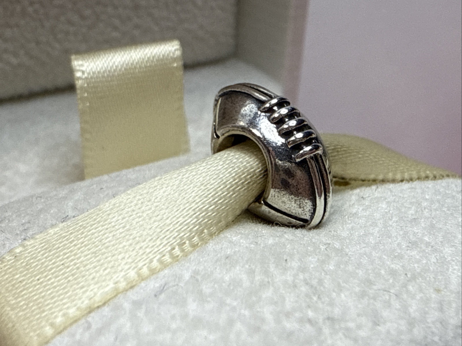 164B NWOT AUTH PANDORA SS FOOTBALL CHARM #790384 RETIRED!