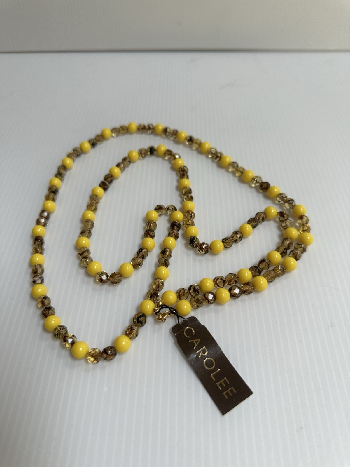VINTAGE 1970s CAROLEE YELLOW BROWN ACRYLIC FACETED GLASS BEADS 40”LONG NECKLACE