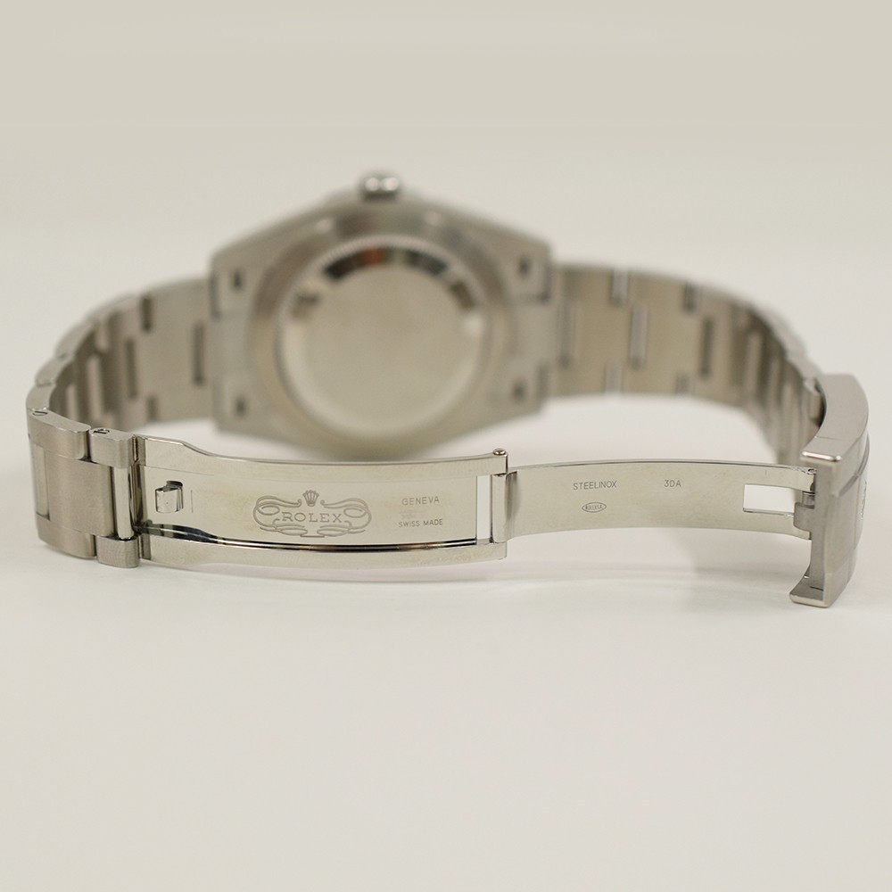 Rolex Oyster Perpetual 41 124300 Celebration Dial Steel Box & Papers Mint