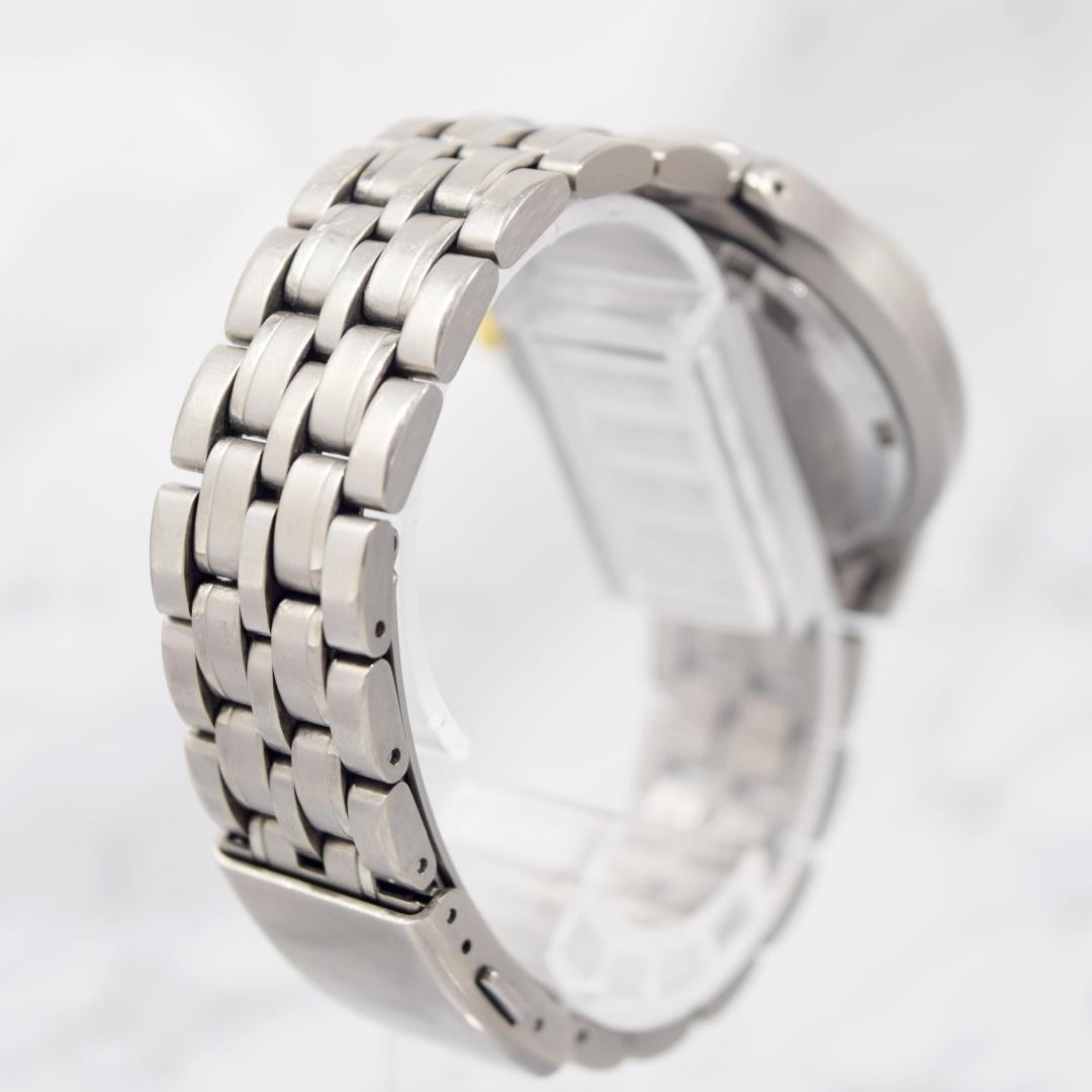 1996 SEIKO Spirit AGS Titanium watch with date display, non-functional.