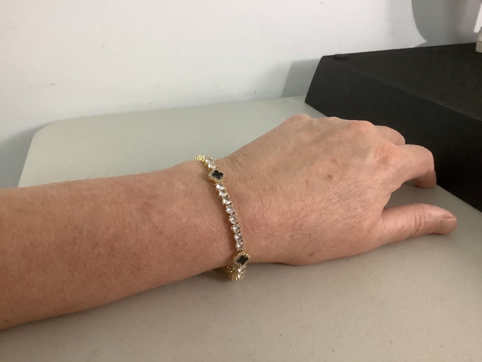 Imperium 18k gold plated CZs four leaf clover black enamel tennis bracelet 7″