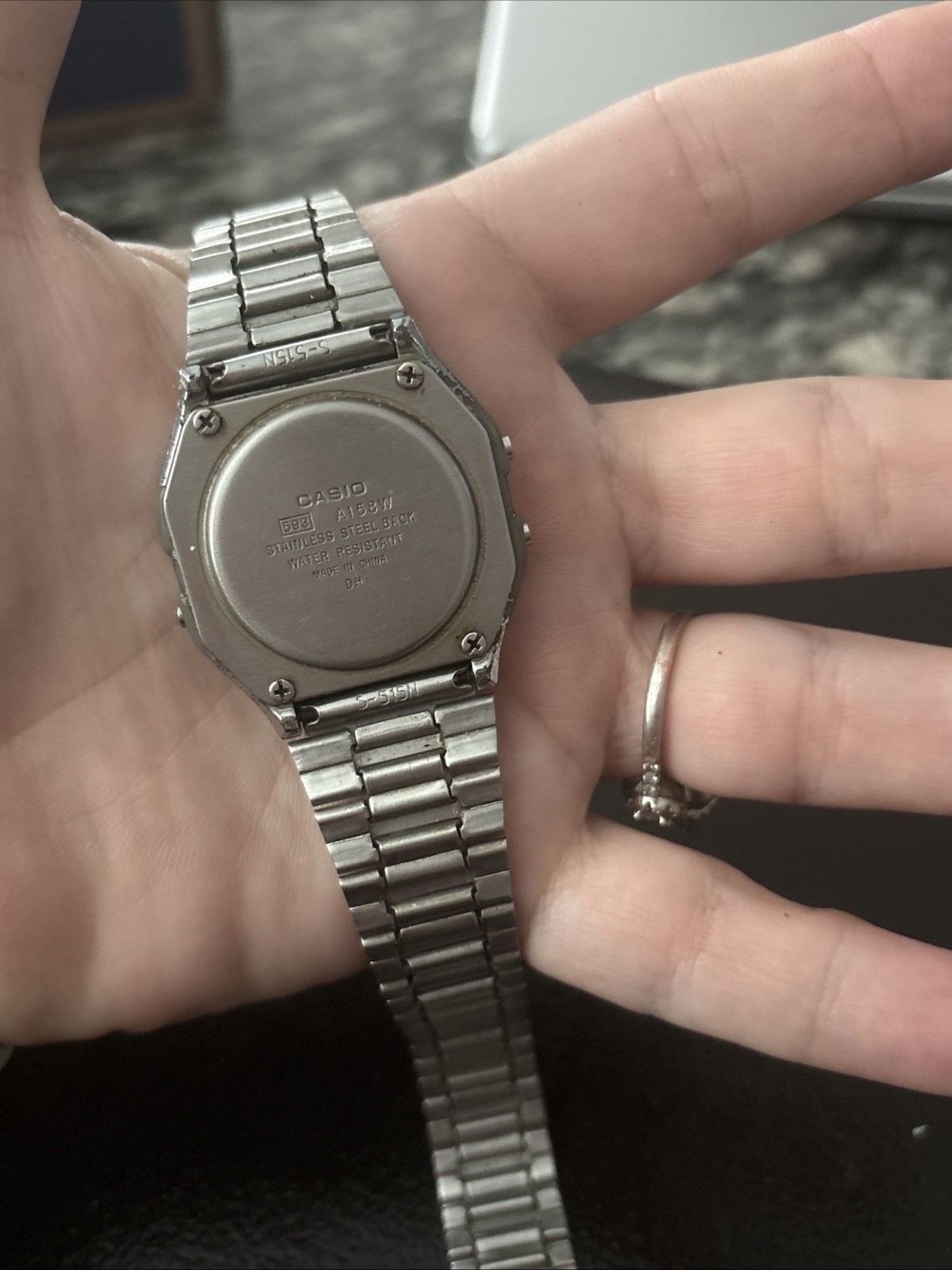 Vintage Casio A158WA-1 digital watch features a classic square face