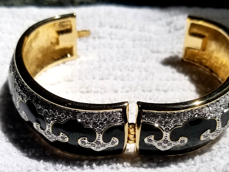 Bejeweled cuff bracelet with Green enamel and Gold tone metal Mint condition