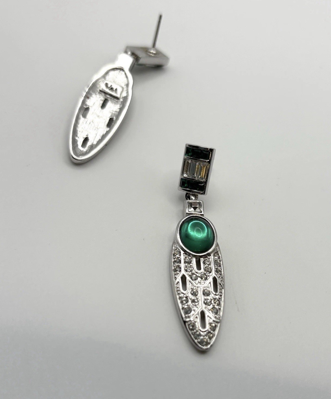 Vintage, circa unknown, designed earrings signed and designed by V&A Museum Shop