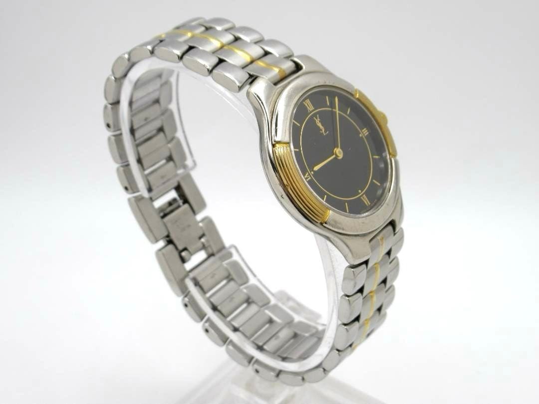 Yves Saint Laurent watch 4620-E66661Y, black dial, working condition.