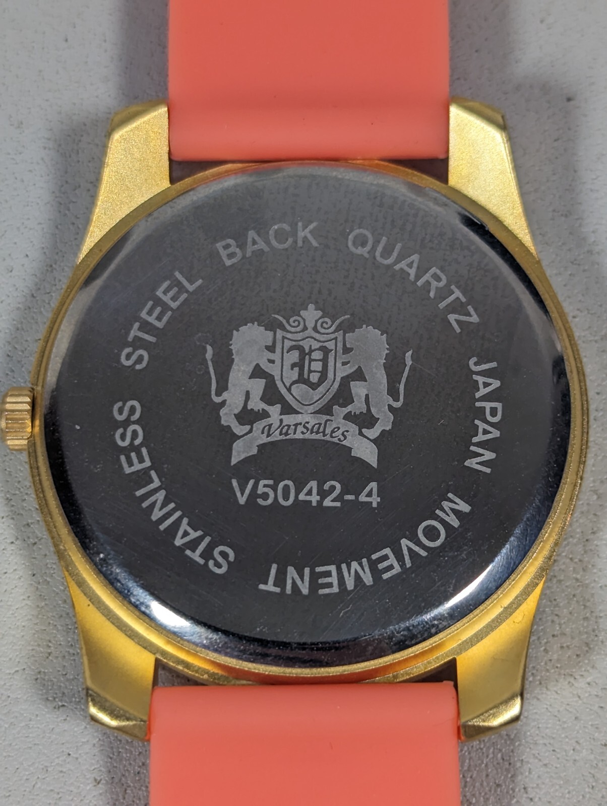 Varsales Womans Silver Tone Dial Gold Tone Case Orange Pink Band Watch