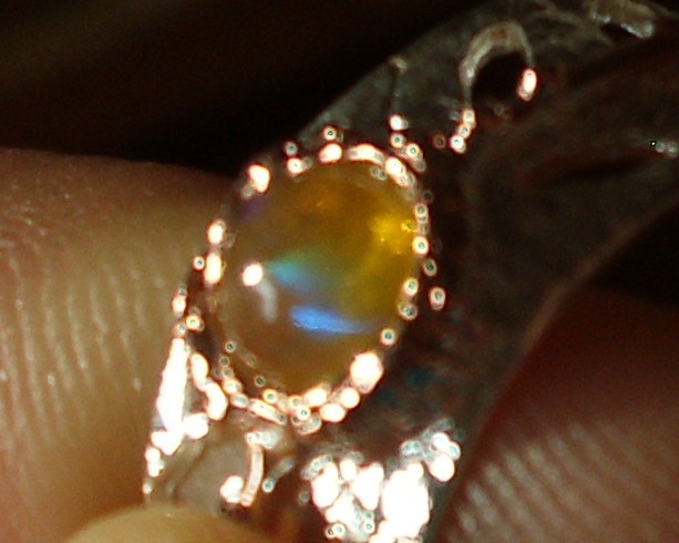 CeS Ring mit einem bunt leuchtenden mexikanischen Feueropal, mexican Opal