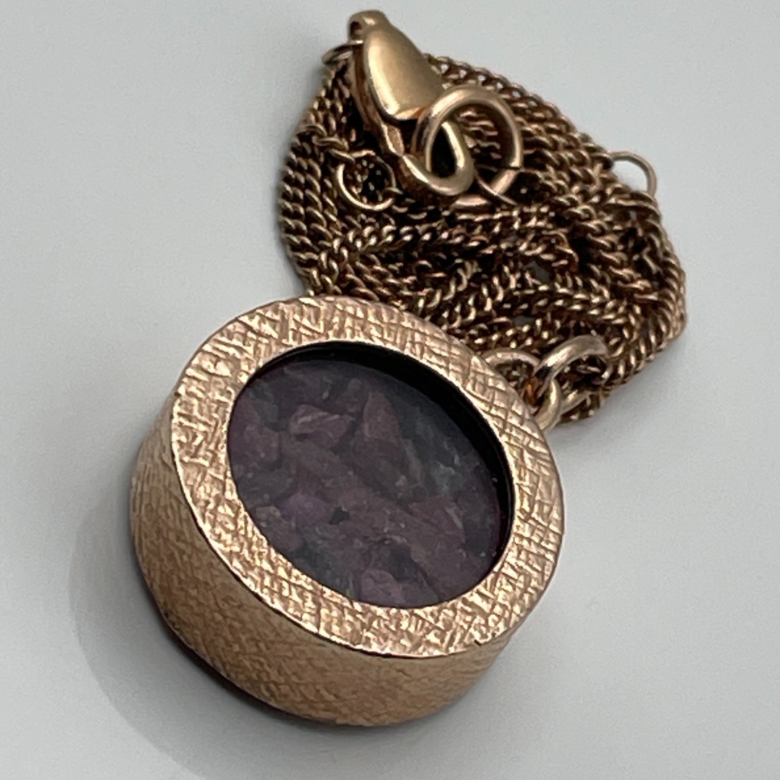 Rose gold on sterling silver/ruby amulet pendant and ‘925’ chain necklace 10.26g