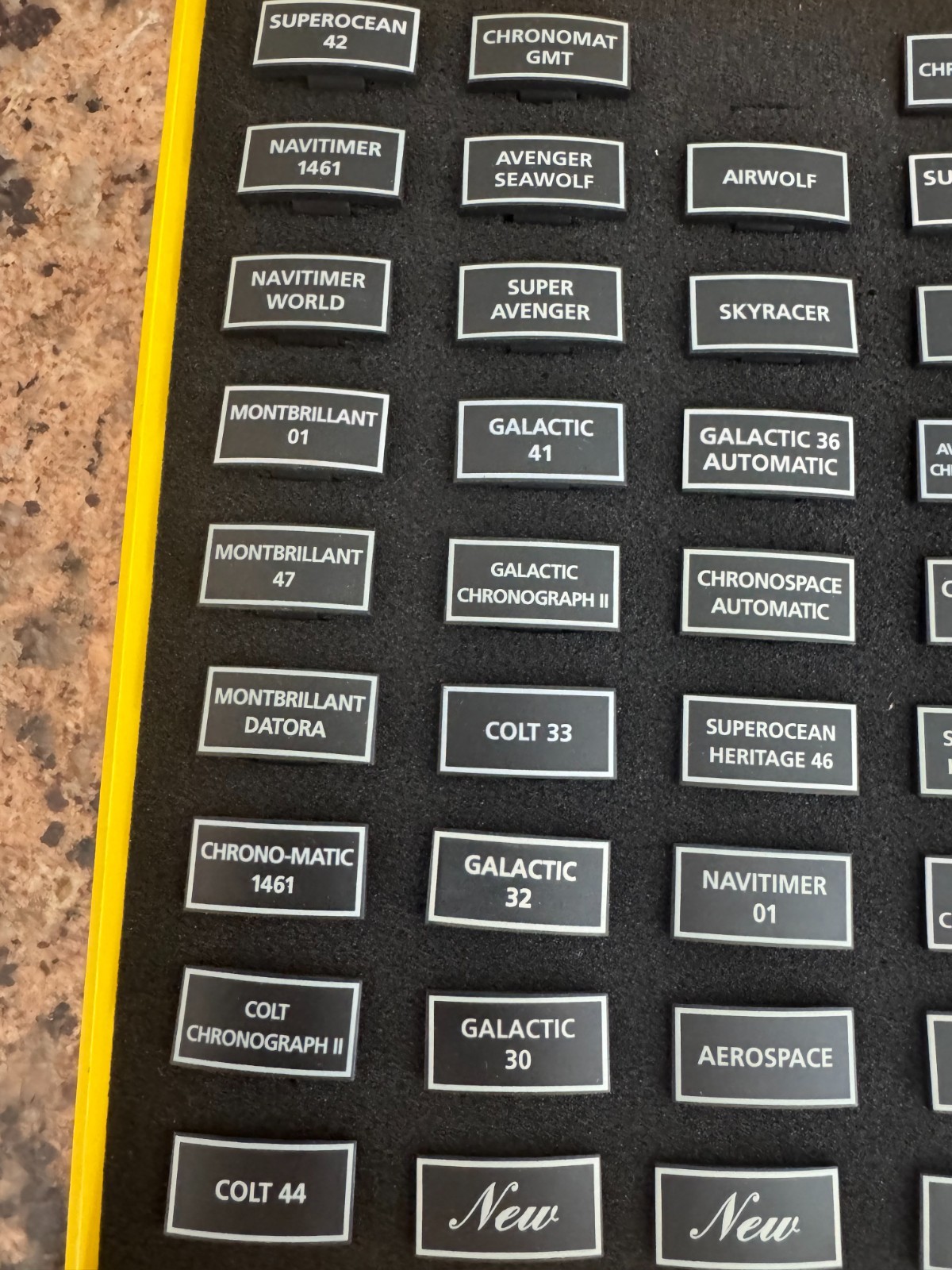 GENUINE BREITLING BOX WITH 44PCS OF VARIES PLASTIC PLAQUES FOR DISPLAY WATCHES