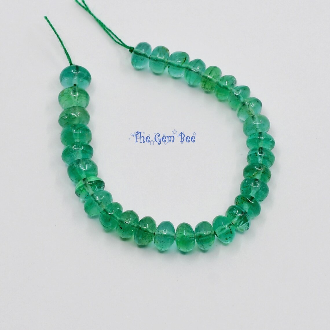 3.8mm-4.3mm Zambian TRANSPARENT Green Emerald Smooth Rondelle Beads 3″ Strand