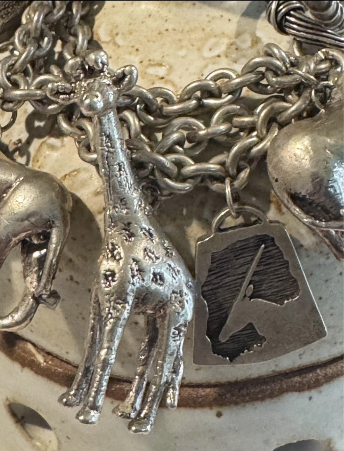 Signed Susan Cummings statement sterling silver African animal charm bracelet