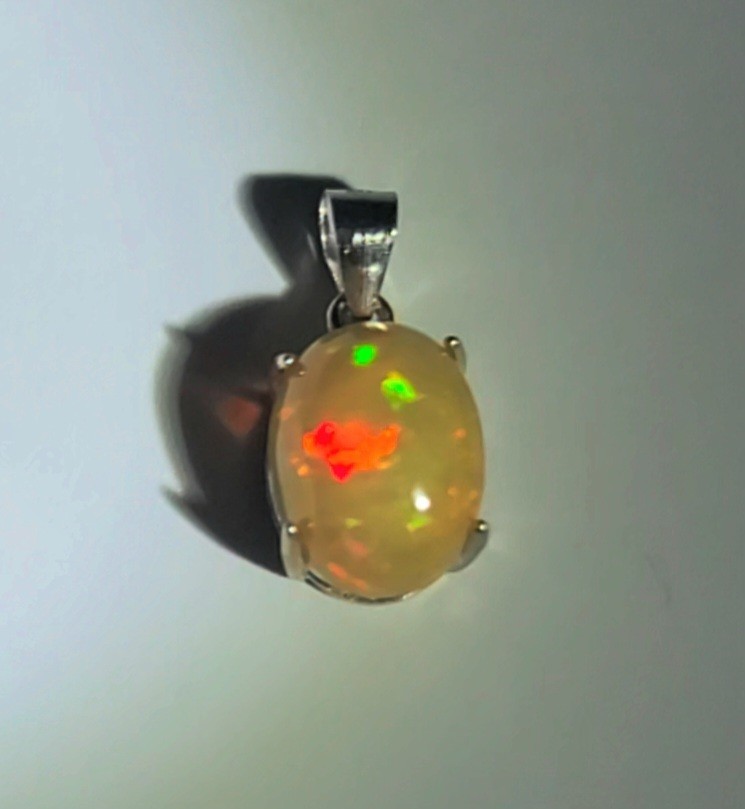 Ethiopian Honey Hue Fire Opal Natural 10X8/925 Sterling Silver (SEE DETAILS)